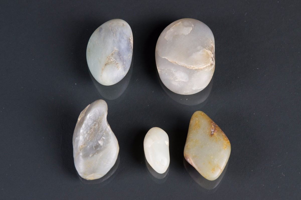 Five Chinese Green Uncarved Jade Pieces
