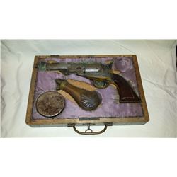 Antique cased cap and ball revolver