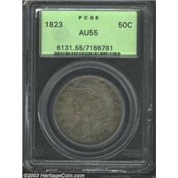1823 50C AU55 PCGS. O-106a, R.2. Peripheral flashes of pumpkin-orange patina shine through a some...
