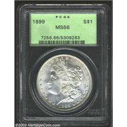 1899 $1 MS66 PCGS. This is a nearly brilliant Morgan with a relatively good strike for the type....