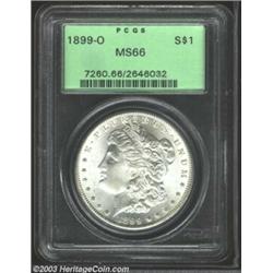 1899-O $1 MS66 PCGS. A brilliant and beautifully struck Gem that has gorgeously preserved surface...