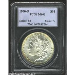 1900-O $1 MS66 PCGS. Satiny with milky silver-gray and golden toning that is deeper on the revers...
