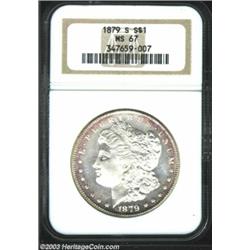 1879-S $1 MS67 NGC. A sparkling, superb example with subtle hints of purple patina decorating the...