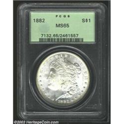 1882 $1 MS65 PCGS. A frosty, lightly-colored example with a minimum of marks. Some beige toning s...