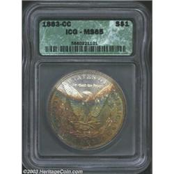 1883-CC $1 MS65 ICG. The reverse is dominated by an arc of intermingled powder-blue, rose-violet,...
