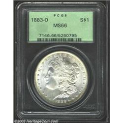 1883-O $1 MS66 PCGS. A lustrous and boldly struck Gem with hints of apricot patina throughout the...