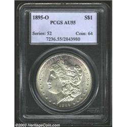 1895-O $1 AU55 PCGS. This lightly-circulated example exhibits superficial, even wear on the high...