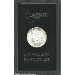 1880-CC $1 MS63 Uncertified. The original box and certificate of issue is included. There is a da...