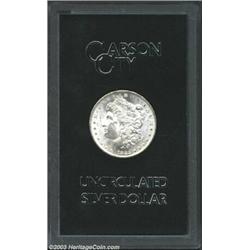 1882-CC $1 MS64 Uncertified. The box of issue is included. A frosty and well struck near-Gem with...