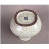 Image 8 : A CHINESE CRACKLE-GLAZED ZUN WITH WOODEN BASE