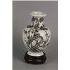 Image 1 : A CHINESE WHITE-GLAZED PORCELAIN VASE