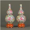 Image 1 : A PAIR OF GOURD-SHAPE FAMILLE ROSE PORCELAIN VASES