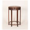 Image 1 : A CHINESE CYLINDERICAL HARDWOOD CHAIR