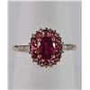 Image 1 : PINK TOURMALINE & DIAMOND RING OVAL PRONG SET PINK TOURMALINE SURROUNDED BY 12