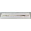 Image 1 : 10 K YELLOW GOLD DIAMOND TENNIS BRACELET APPROXIMATELY 1/2 CT TOTAL DIAMOND