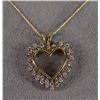 Image 1 : 14 K YELLOW GOLD DIAMOND HEART NECKLACE WITH 20" 14 K YELLOW GOLD CHAIN. 44