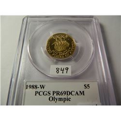 Mercanti Signed Holder 1988-W $5 U.S. Gold Olympic, PCGS PR69DCAM, AGW=.242 Ounce Gold