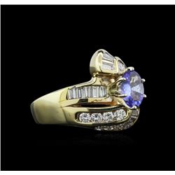 0.80ct Tanzanite and Diamond Ring - 14KT Yellow Gold