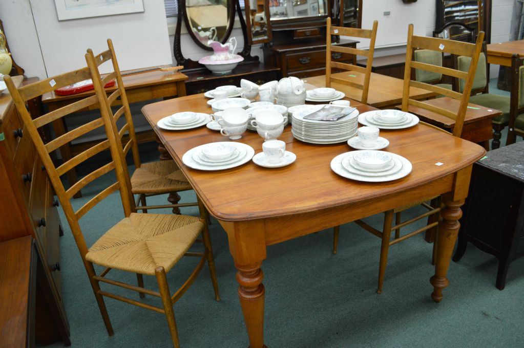 Four antique Quebec pine ladder back chairs with rush seats and table