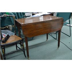 Antique small drop leaf table with brass castors