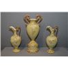 Image 1 : A four piece unmarked semi-porcelain mantle set including two handled ewers and a double handled cen