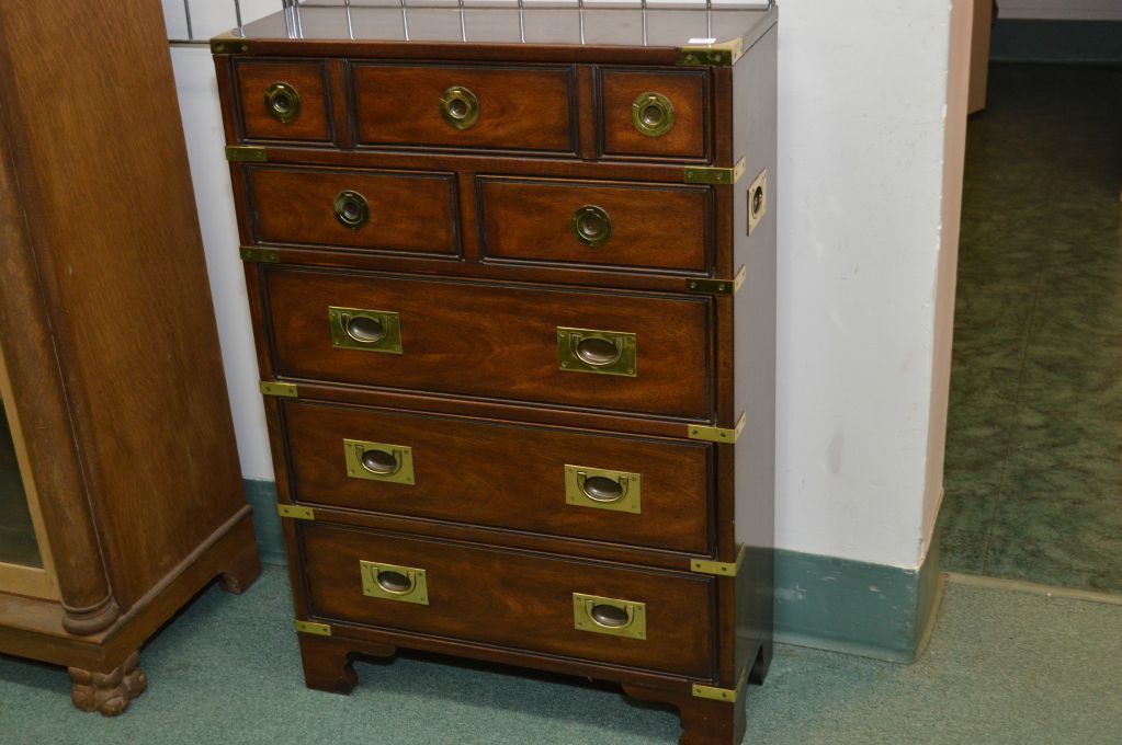 Six drawer Bombay style chest with brass pulls and accents made by