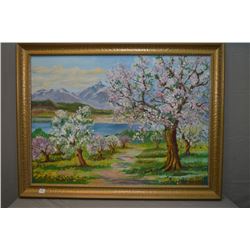 Two framed oil on canvas paintings including Spring mountain orchard scene and a Prairie harvest sce