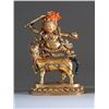 Image 1 : [CHINESE]A LATET 19TH CENTURY SINO-TIBETAN GILT-BRONZE FIGURE Depicting Mahakala wearing a skull apr
