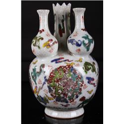 [CHINESE]A "QIAN LONG NIAN ZHI"MARKED WUCAI GLAZED VASE WITH FIVE SPOUTS PAINTED WITH THE CHINESE AM