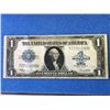 Image 2 : USA; $1.00 note 1923 T77701088D Silver Dollar, Fine with light tear in bottom center fold.