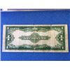Image 3 : USA; $1.00 note 1923 T77701088D Silver Dollar, Fine with light tear in bottom center fold.