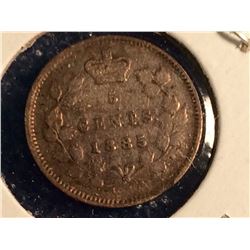 5 cents 1885 in Very-Good 10 Small 5 Over 5 with small clip at 5 o,clock.