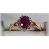 Image 1 : 10 K YELLOW GOLD LAB CREATED RUBY AND DIAMOND RING. OVAL SHAPED CENTER STONE