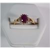 Image 2 : 10 K YELLOW GOLD LAB CREATED RUBY AND DIAMOND RING. OVAL SHAPED CENTER STONE