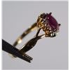 Image 3 : 10 K YELLOW GOLD LAB CREATED RUBY AND DIAMOND RING. OVAL SHAPED CENTER STONE