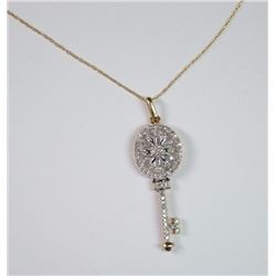 10 K YELLOW GOLD DIAMOND OVAL KEY PENDANT. VERY FANCY & SLEEK. PAVE DIAMOND KEY: