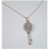 Image 1 : 10 K YELLOW GOLD DIAMOND OVAL KEY PENDANT. VERY FANCY & SLEEK. PAVE DIAMOND KEY:
