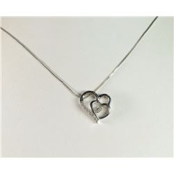 DIAMONDS IN RHYTHM 1/15 CT TW DIAMOND NECKLACE IN STERLING SILVER. TWO STERLING