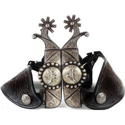 E.G. stamped spurs double mounted,