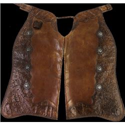 Large showy hand carved batwing chaps