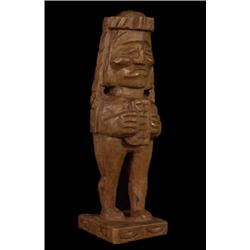 Alex Julian Carved Totemic Figure of a Shaman Holding Copper 12 1/4" H. Fine Condition…