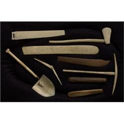 Nine Carved Ivory and Bone Inuit Artifacts, Folding Toothpick 3  L., Miner's Pick, Axe, Shovel, S…