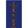 Image 4 : Superb Charlie James Carved Totem Thunderbird, Bear Feeding on Seal, Standing on Shaman Holding S…