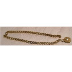 Extremely heavy chain about 12 inches long with medallion like a pearl (not one?) as is no clasp