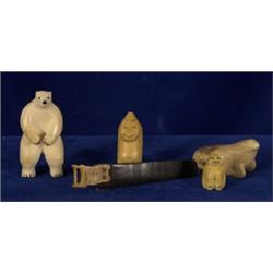 Inuit Carved Walrus Ivory Polar Bear, Two Billikens, Seal, and a Saw with a Baleen Blade 3 1/2"…