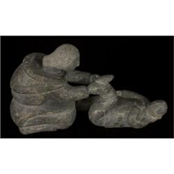 Superb Older Inuit Carving of Mother Struggling with Child's Boot Signed #E9-1029 by Arnaituk Kup…