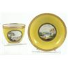 Image 1 : A Derby yellow ground porcelain teacup and saucer, circa 1790, enamelled with circular scenes of...