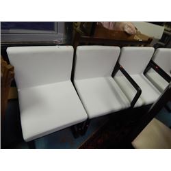 WHITE LEATHER UPHOLSTERED CHAIRS - NO ARMS