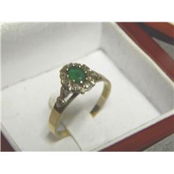 RING - FROM ESTATE STORAGE LOCKER - 10K GOLD - OVAL CUT EMERALD SURROUNDED BY DIAMONDS