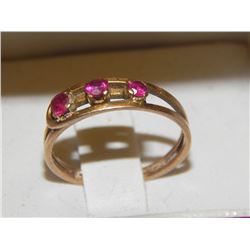 RING - FROM ESTATE STORAGE LOCKER - 10K GOLD - THREE RED STONES - RUBIES? - CENTER STONE NEED CLAW F